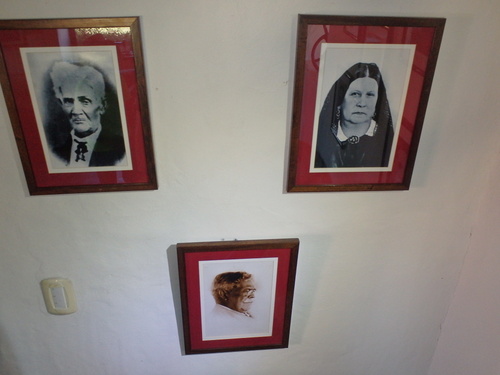 Old Family Portraits on display.